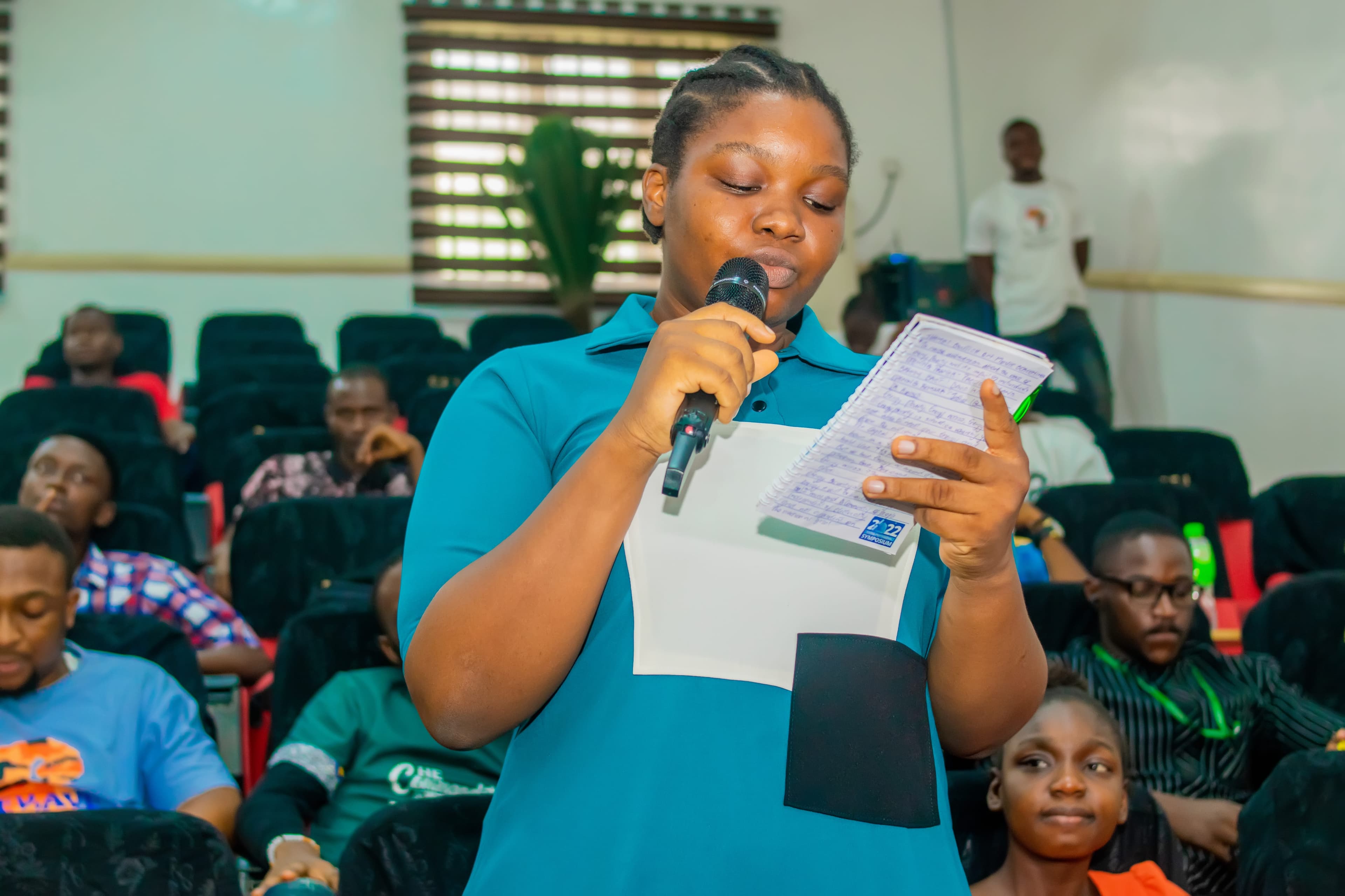 Picture taken at AYEN conference in UNIPORT. A Woman speaking at AYEN conference